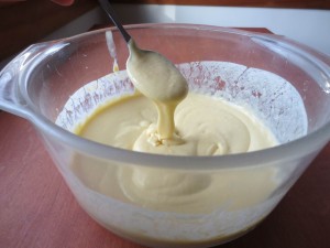 Shows thickness of warm custard base (after straining in this case)